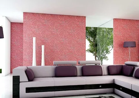 Living room with pink and red cotton plaster wall sections (illustrative view)